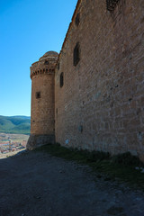 Fototapeta na wymiar Tower and wall of medieval castle La Calahorra, Granada, Andalucia, Spain