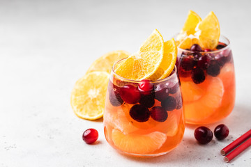 Cranberry orange sangria. Selective focus, copy space.