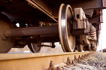 Fototapeta na wymiar Wheel of a railway train. Freight train on the railway tracks