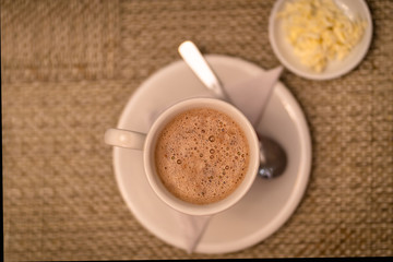 Hot chocolate mug, served with cheese