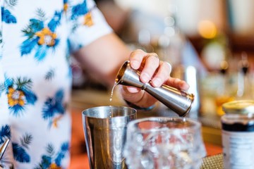 Bartender making cocktails in a bar