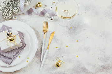 Christmas table place setting and winter holiday decorations