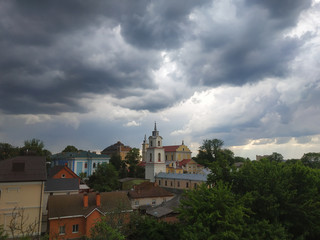Church in summer at blue cloudy sky