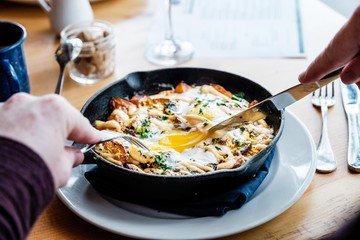 Person eating breakfast