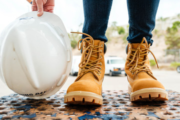 Work boots and construction hat