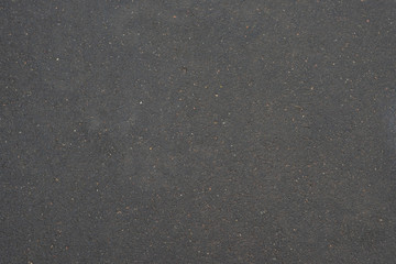 Smooth asphalt road. The texture of the tarmac, top view.
