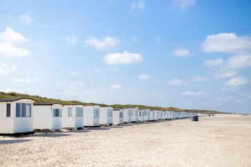 Fototapeta na wymiar White Beach Cabins at Lokken Beach