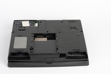 View of the underside of the laptop, removed the hard disk drive, removed the battery and floppy disc drive