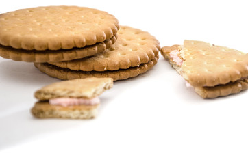 sandwich crackers and cracker slices on a white background. View from above. Close-up.