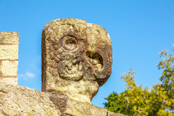 Obraz premium A figure of a head in the temples of Copan Ruinas. Honduras