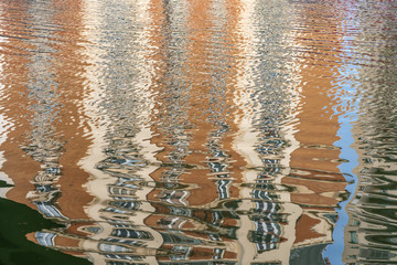 Paris, France - 12 29 2019: Ourcq Canal. Reflection of a building on the water