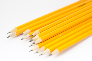Yellow pencils isolated on white background