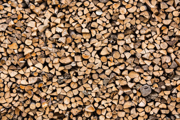 The texture of the wall of firewood, after sawing wood.