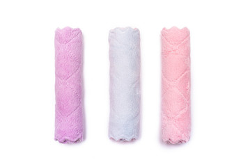 Various rolled towels isolated on the white background. Top view.