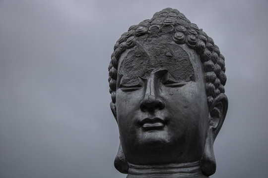 Broken Buddah statue head