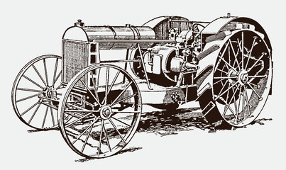 Fototapeta na wymiar Historical tractor in three-quarter front view. Illustration after an engraving from the early 20th century
