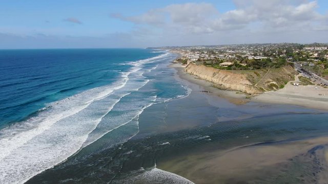 Aerial view of Del Mar North Beach, California coastal cliffs and House with blue Pacific ocean. San Diego County, California, USA