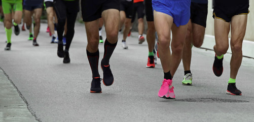 runners during a road marathon