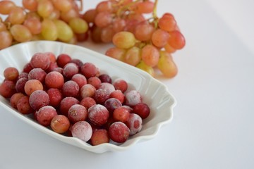 Fototapeta na wymiar Frozen grapes, healthy dessert, ready to eat