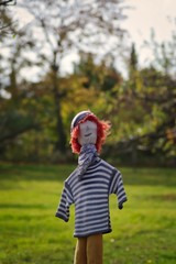 A scarecrow with red hair