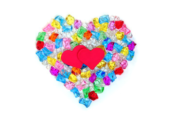 Heart shape made of colored transparent stones