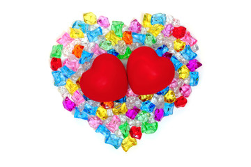 Heart shape made of colored transparent stones