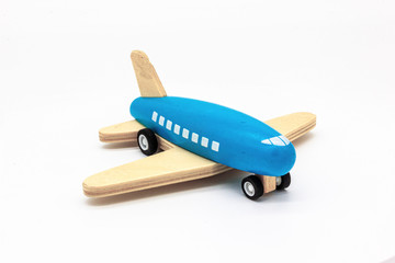 Blue Wooden Airplane Isolated on White Background. Perfect for a baby boy toy concept.