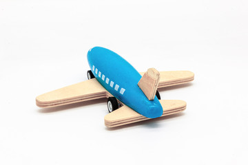 Blue Wooden Airplane Isolated on White Background. Perfect for a baby boy toy concept.