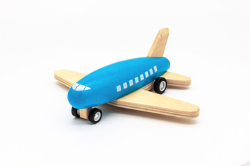Blue Wooden Airplane Isolated on White Background. Perfect for a baby boy toy concept.