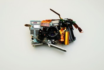 Digital camera electronic waste on white background