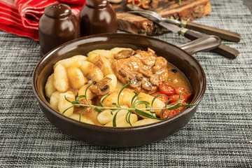 Braised pork chop with mushrooms.