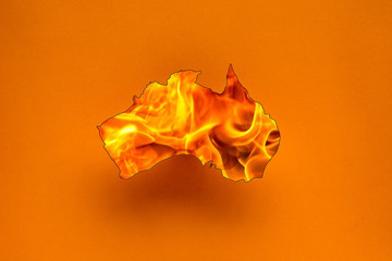 burning map of Australia on a orange background - Australia bushes wildfires