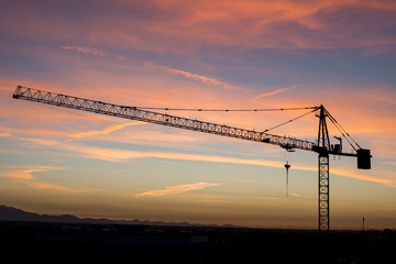 tower crane in a colorful sky