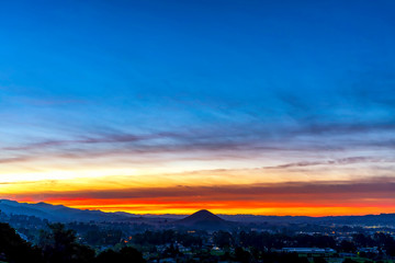 Obraz premium Sunset in Silhouetted Mountains 