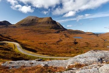 Highway leading through the Scottish highlands.