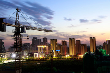 Tower cranes at night