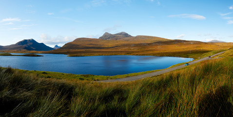 Idyllic scenery with a mountain range and a lake in Scotland