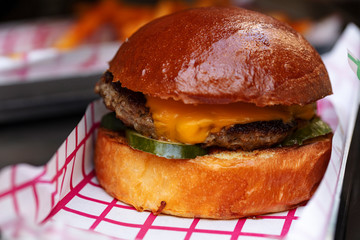 Fresh tasty hamburger with meat patties and cheddar cheese