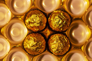 luxury sweets chocolate in a gold wrapper