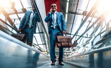 Portrait of handsome businessman outdoors in the city