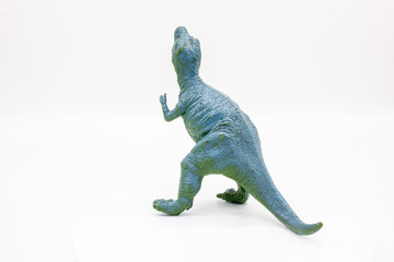Plastic Dinosaur Isolated on White Background, Tyrannosaurus Rex Toy. 