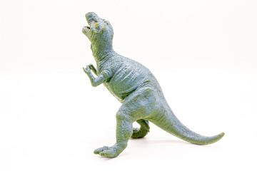Plastic Dinosaur Isolated on White Background, Tyrannosaurus Rex Toy. 