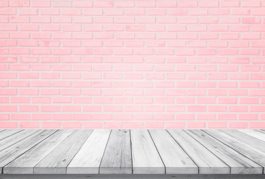 Empty wooden table top isolated on pink brick white background, Design Wood terrace white. Free space for your copy and branding. Can be used as product display montage. Vintage style concept.
