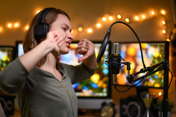 Reading a radio host or blogger text in a home studio into a microphone, radio or broadcast....