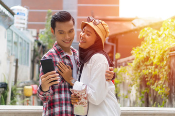 Travel Concept, Muslim Tourist Couple at Kuala Lumpur