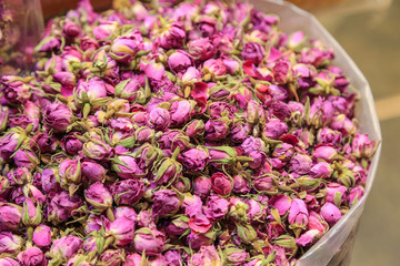 Closed up dried pink roses at market stall in Shiraz, Iran where roses are very famous for fragrance industry in Iran