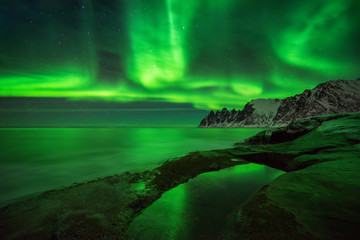 Obraz na płótnie Canvas Aurora over Ersfjord
