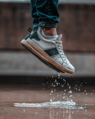 jumping on a puddle in the rain