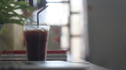 cup of coffee on wooden table