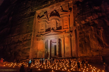 PETRA, JORDAN - MARCH 22, 2017: Tourists visit the Al Khazneh temple (The Treasury) during Petra by...